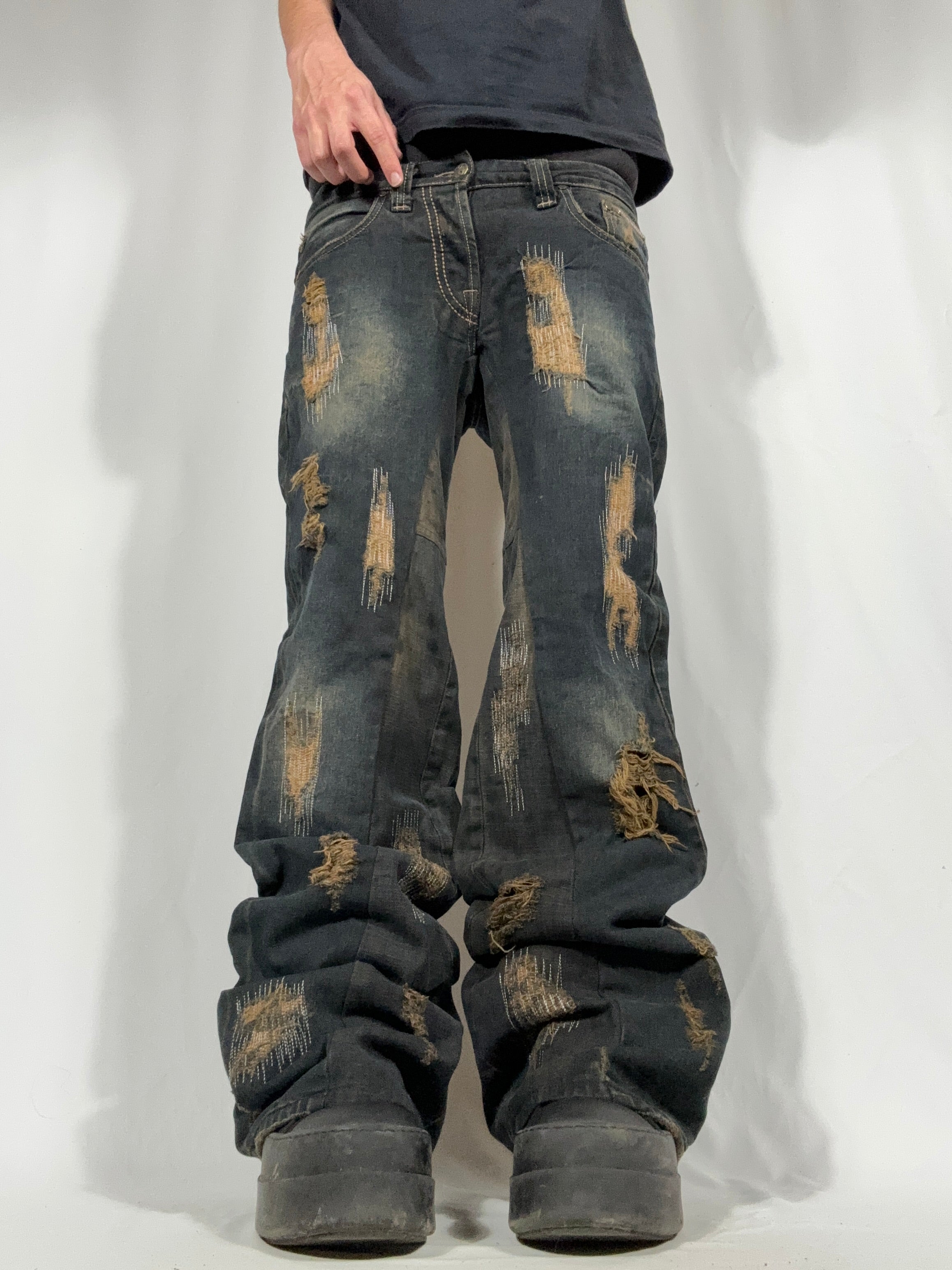 Flared Distressed Dirty Repair Jean