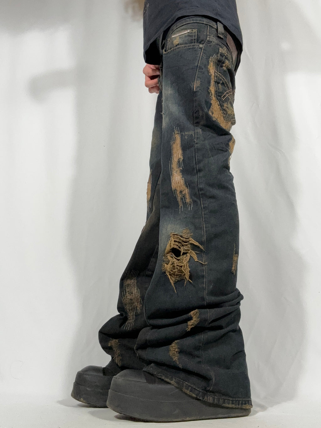 Flared Distressed Dirty Repair Jean