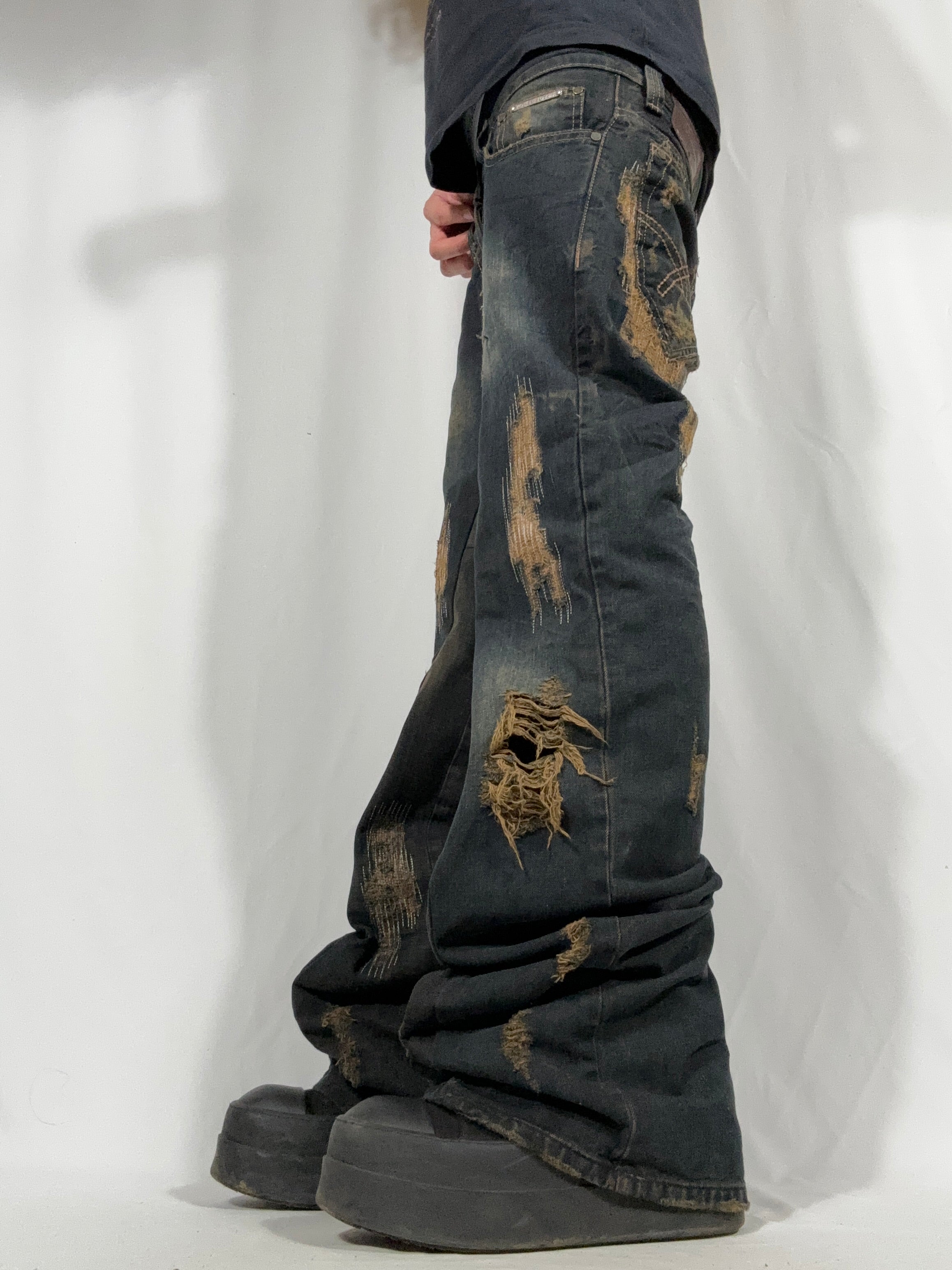Flared Distressed Dirty Repair Jean