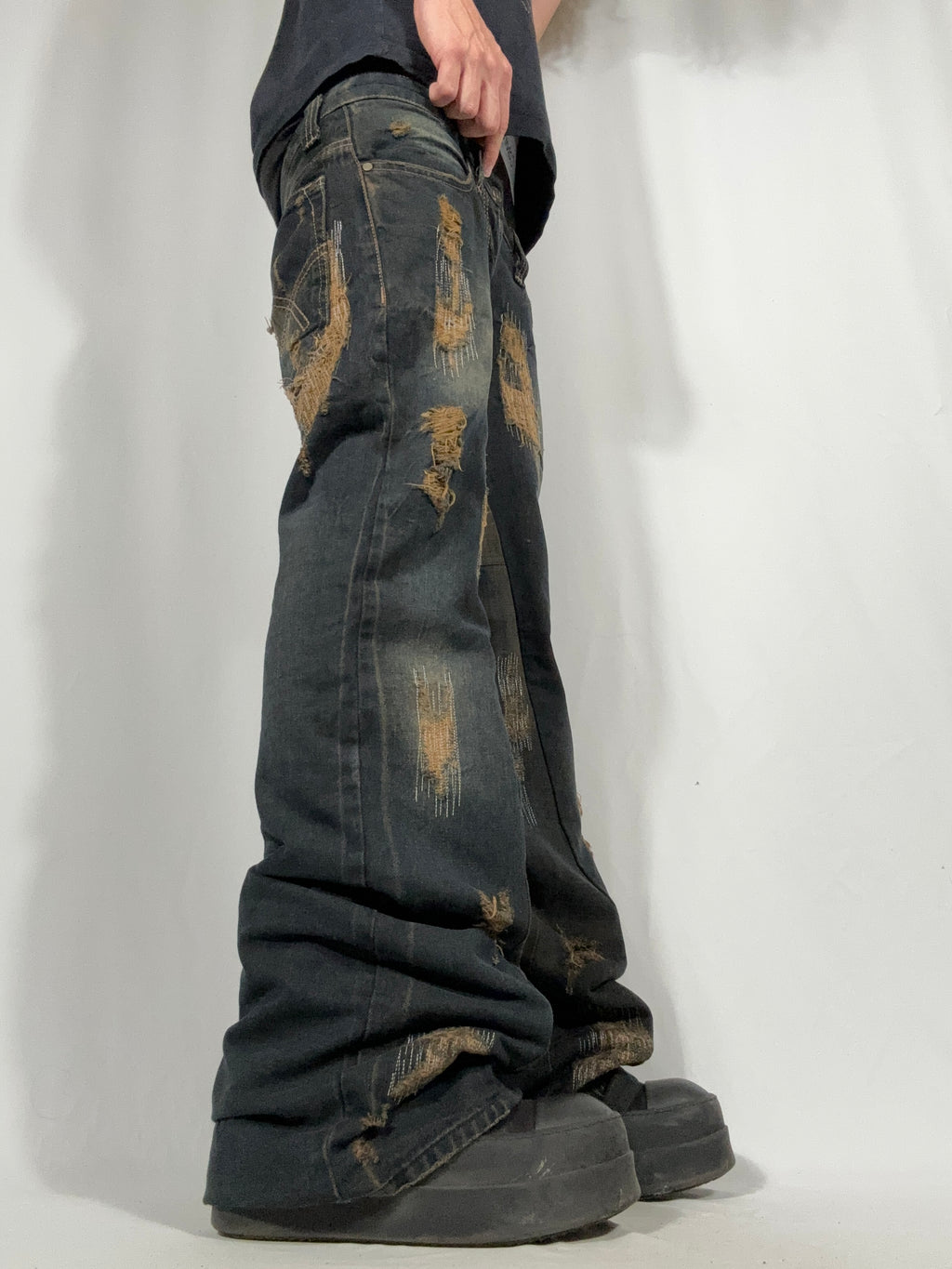 Flared Distressed Dirty Repair Jean
