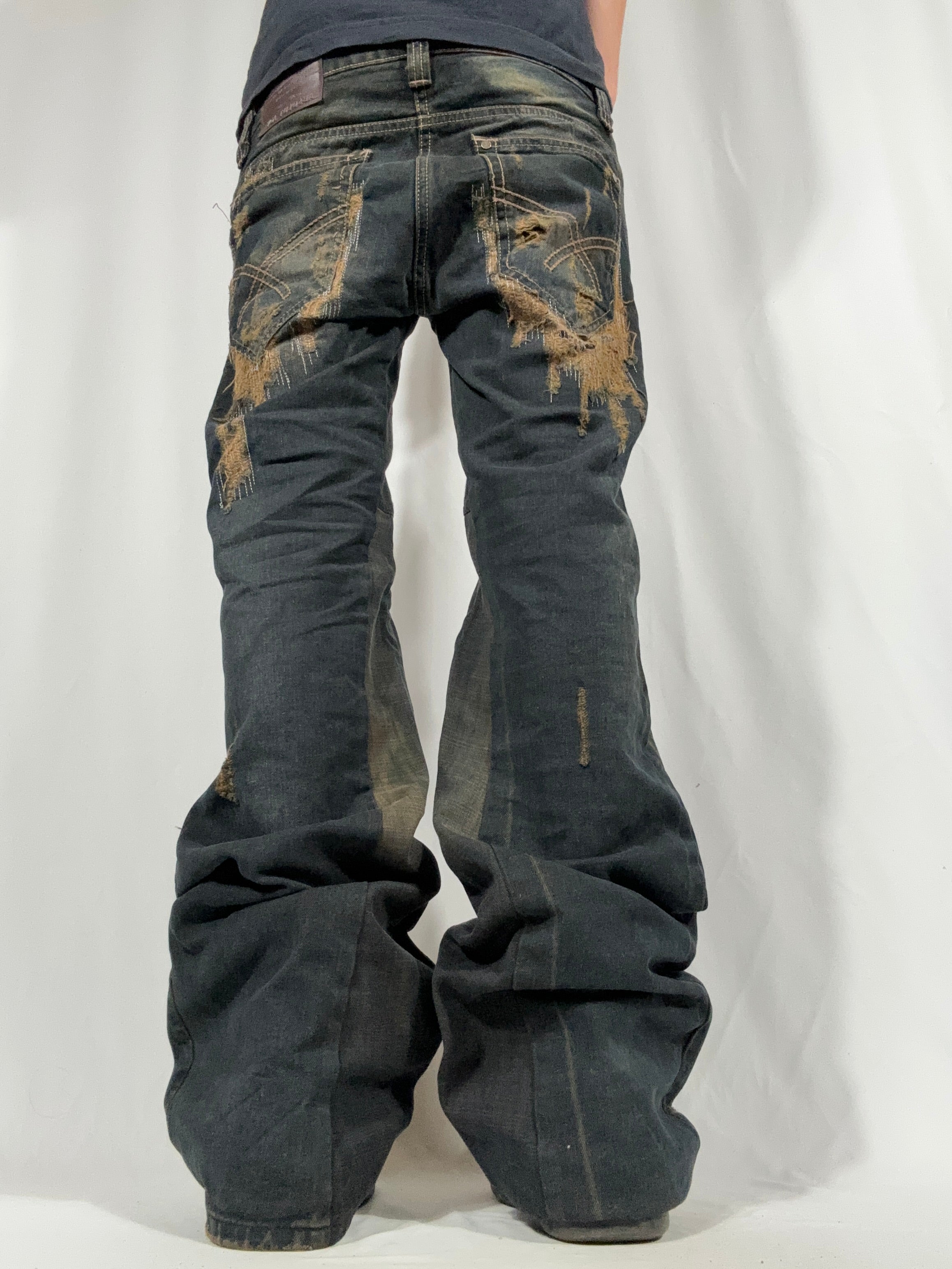 Flared Distressed Dirty Repair Jean