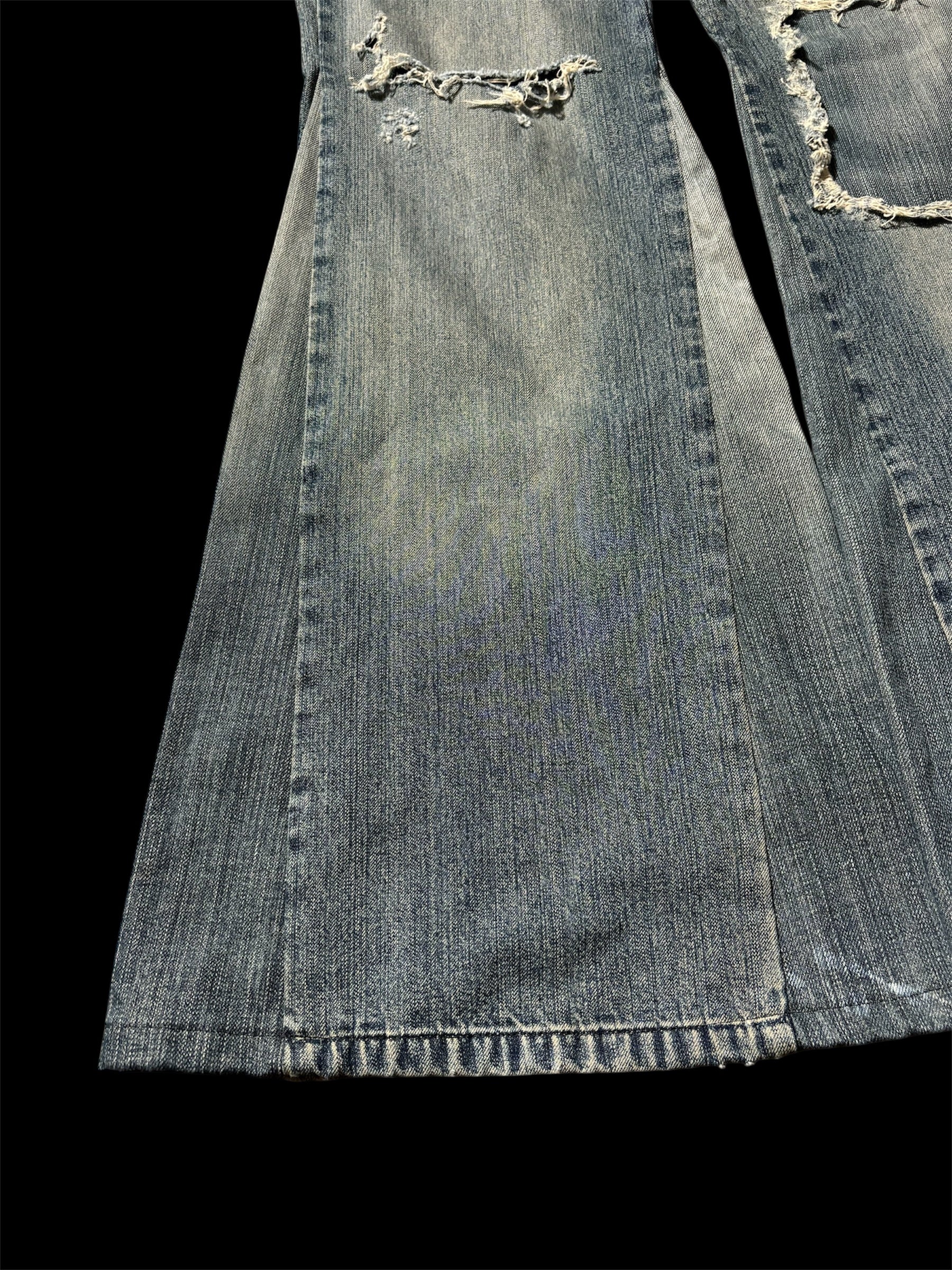 Big Flared Distressed Jeans
