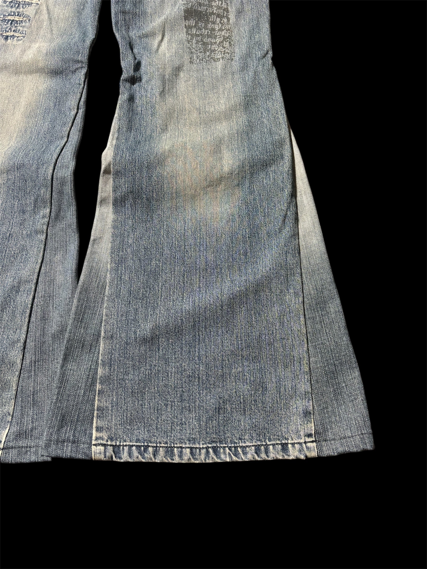 Big Flared Distressed Jeans