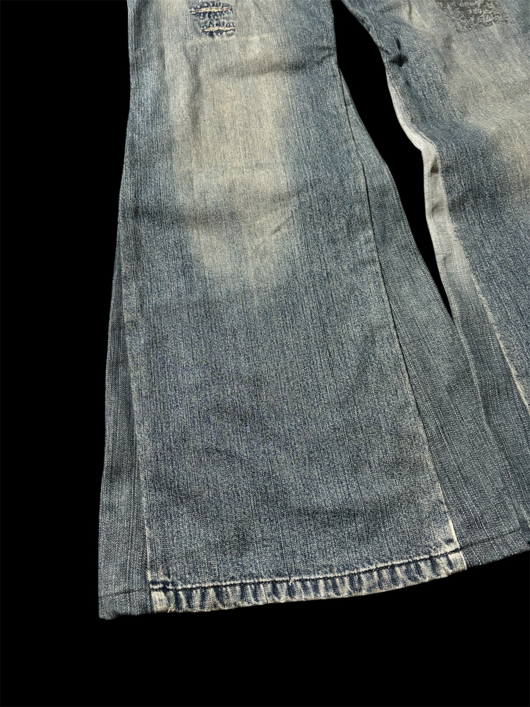 Big Flared Distressed Jeans